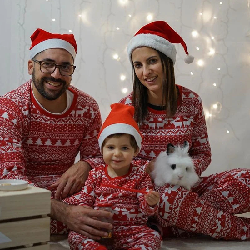 Mommy and me matching Christmas pajamas set featuring festive holiday designs, perfect for family bonding and cozy holiday celebrations. Ideal for creating memorable family photos during the Christmas season