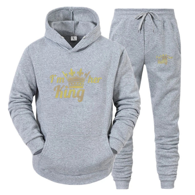 Gray hoodie and jogger set with 'I'm her king' text on a white background
