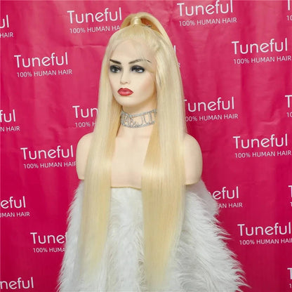 Mannequin head with a blonde wig against a pink background with 'Tuneful' branding.