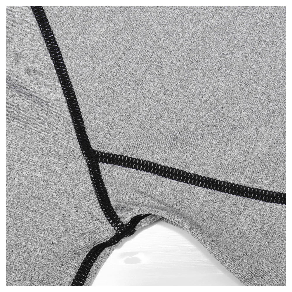 Close-up of a textured gray surface with black zipper