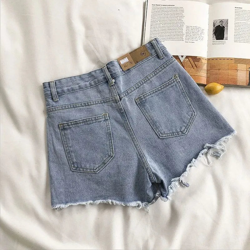 Women’s Korean high-waist ripped denim shorts with tassel pocket detail in blue