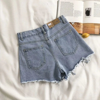 Women’s Korean high-waist ripped denim shorts with tassel pocket detail in blue