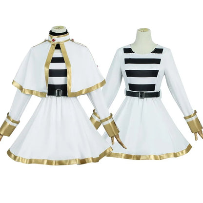 White outfit with black and gold accents on mannequins against a white background