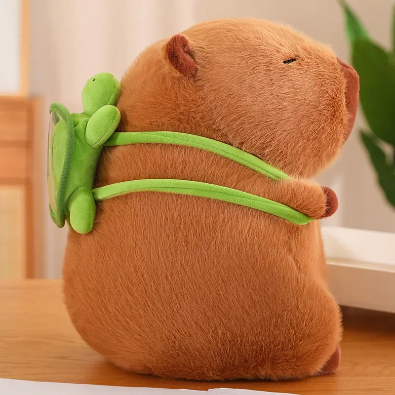 Plush toy beaver with a green backpack on a wooden surface
