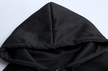 Close-up of a black hoodie on a white background