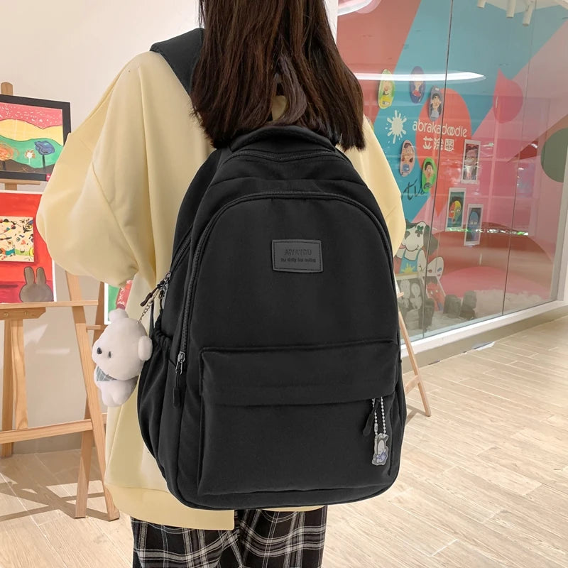 Trendy high-capacity waterproof college backpack with laptop compartment for girls