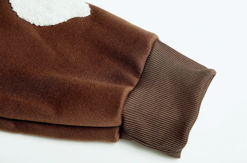 Brown fabric with a textured pattern on a white background