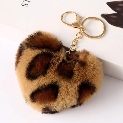 Leopard print fluffy keychain on a white background
