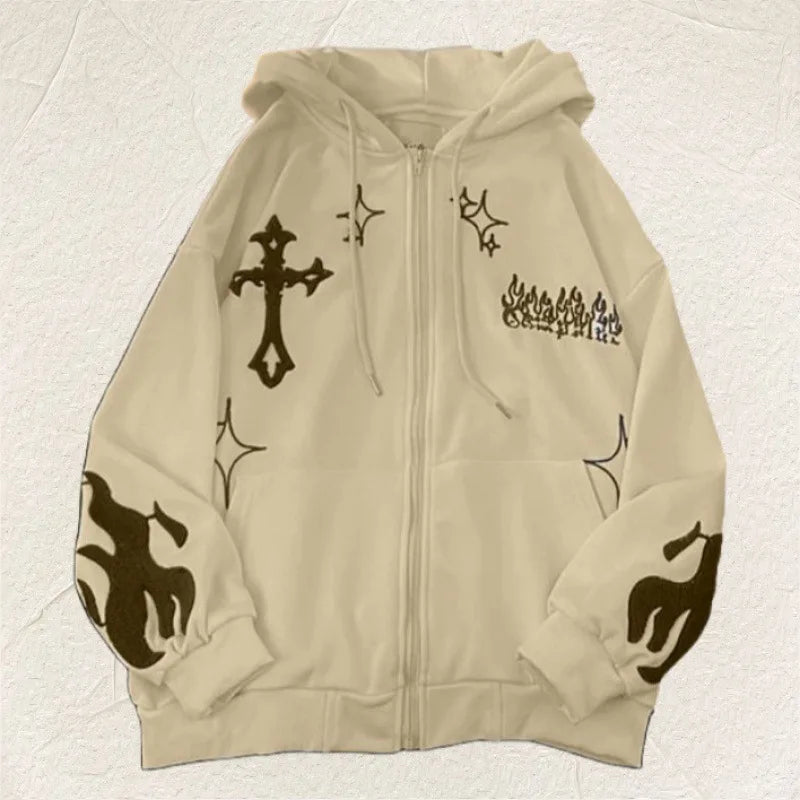 Beige hoodie with black designs on a textured beige background