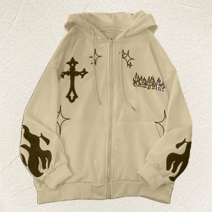 Beige hoodie with black designs on a textured beige background