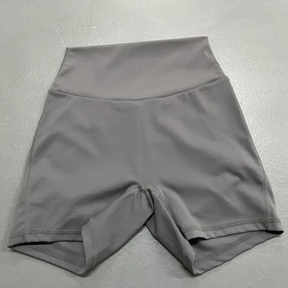 Women’s peach butt cargo yoga pants with air-dry pockets – breathable three-quarter fitness shorts