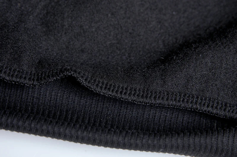 Close-up of black fabric texture on a white background