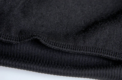 Close-up of black fabric texture on a white background