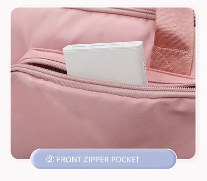 Pink bag with a front zipper pocket containing a white item, labeled 'Front Zipper Pocket'.