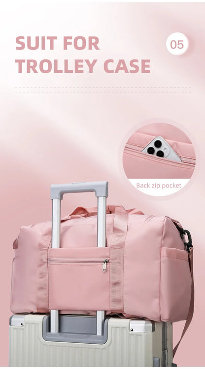 Pink duffel bag with trolley case on a pink background