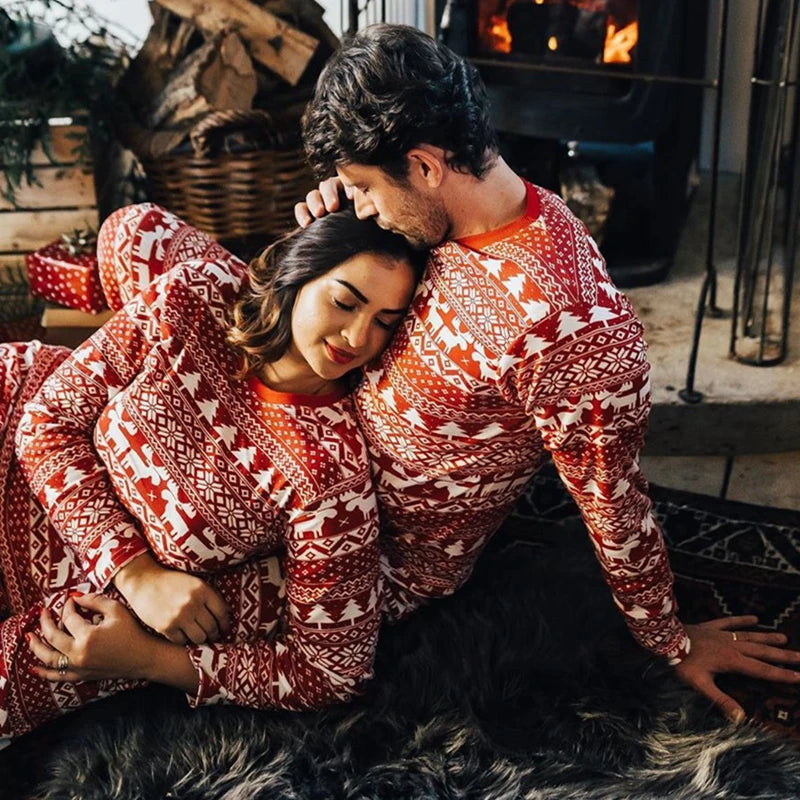 Mommy and me matching Christmas pajamas set featuring festive holiday designs, perfect for family bonding and cozy holiday celebrations. Ideal for creating memorable family photos during the Christmas season