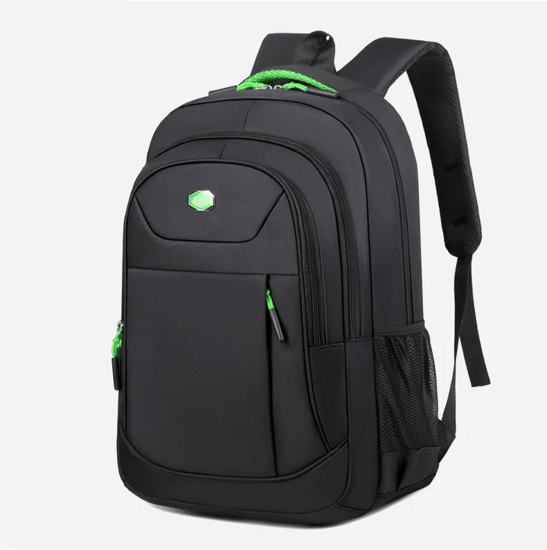 Black backpack with green accents on a white background