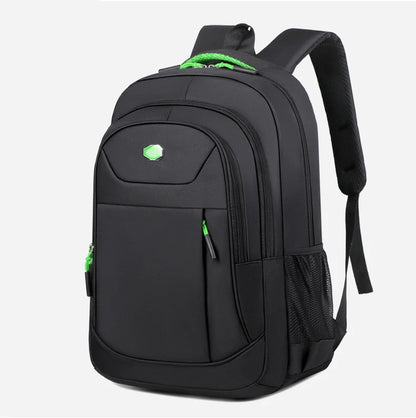 Black backpack with green accents on a white background