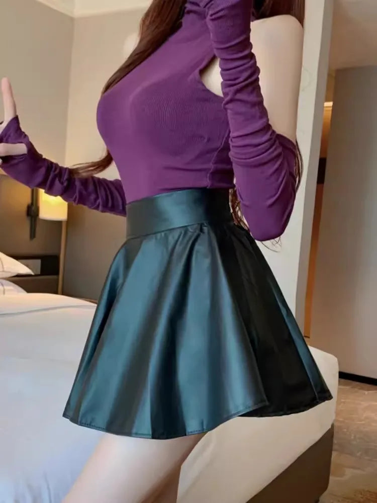 High waist faux leather mini skirt for women – black stretch skater skirt styled for clubwear, work, or casual nights out