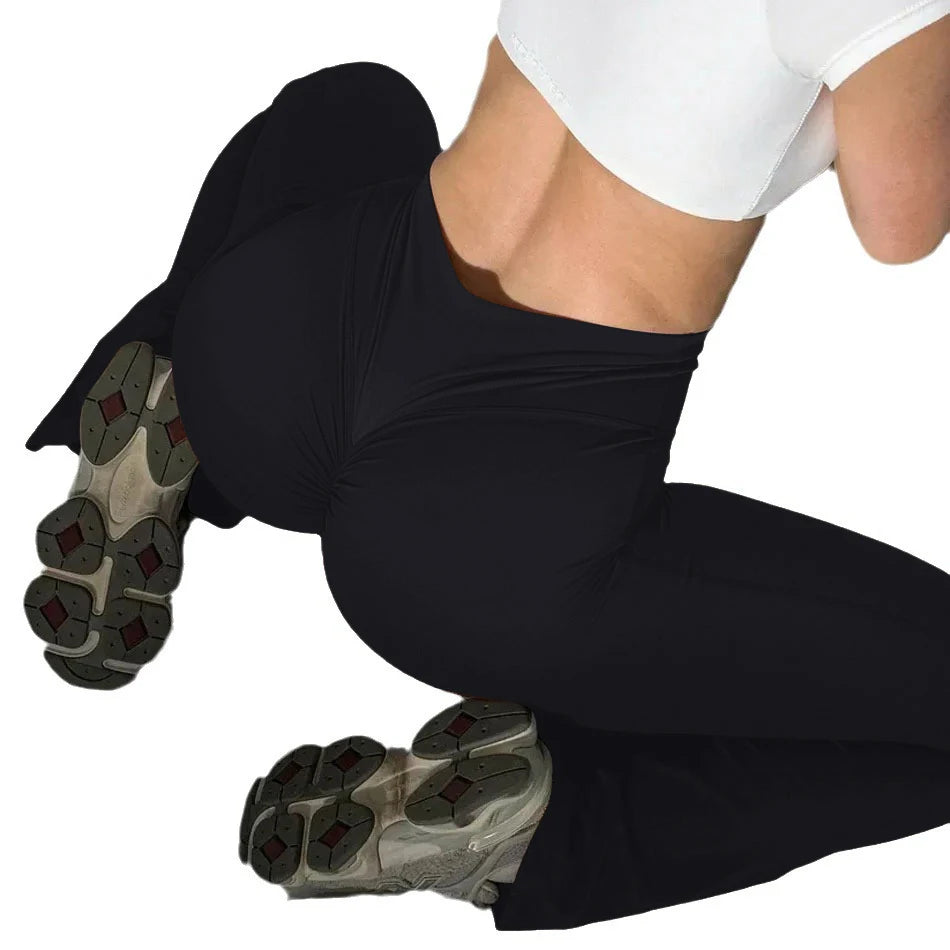 High-waist women’s scrunch butt yoga leggings in black, moisture-wicking fitness and gym pants with butt-lifting design