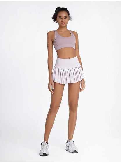 High-waist pleated tennis skirt pants with built-in shorts, breathable and lightweight for summer fitness activities