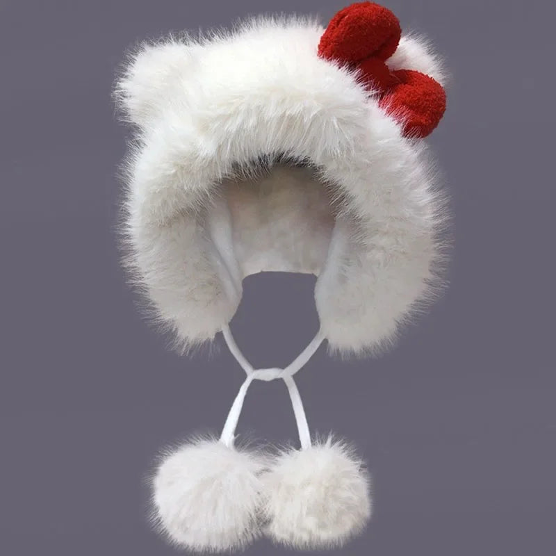 White furry hat with red and white pom-poms on a dark background
