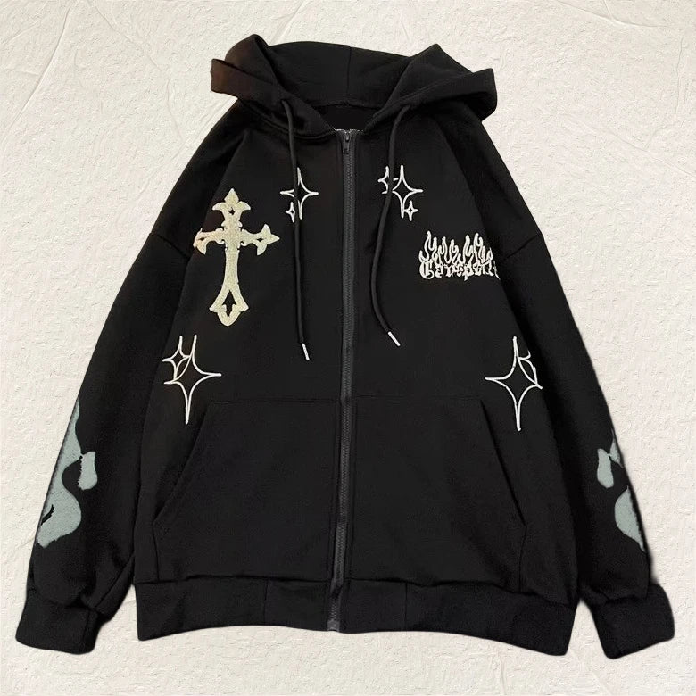 Black hoodie with white designs on a light beige background