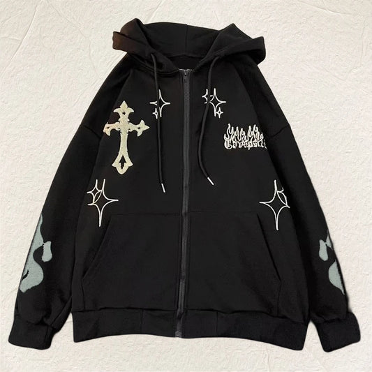 Black hoodie with white designs on a light beige background