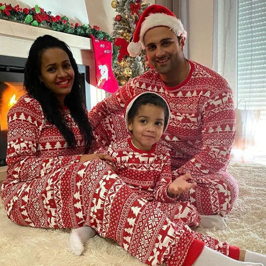 Mommy and me matching Christmas pajamas set featuring festive holiday designs, perfect for family bonding and cozy holiday celebrations. Ideal for creating memorable family photos during the Christmas season