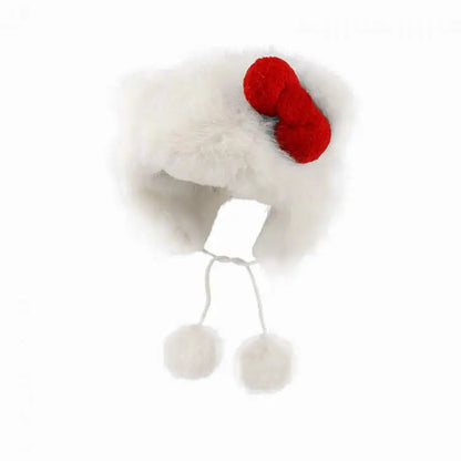 White furry hat with red and white pom-poms on a white background