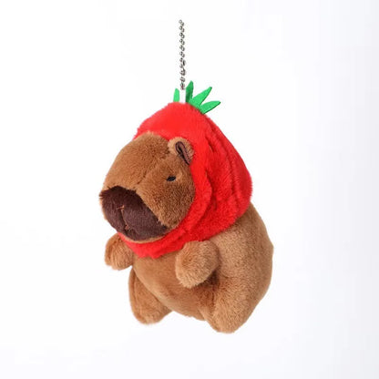 Plush keychain shaped like a bear wearing a red scarf on a white background