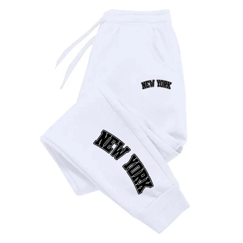 Unisex casual sports sweatpants in charcoal gray, slim jogger fit with elastic waistband and zip pockets