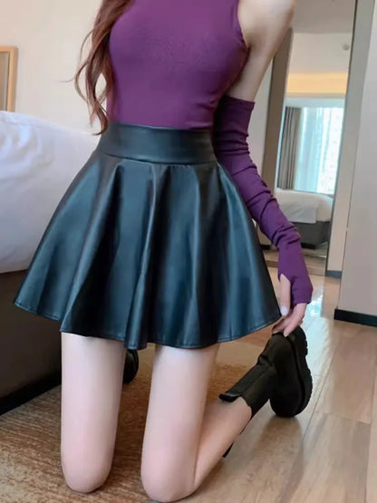 High waist faux leather mini skirt for women – black stretch skater skirt styled for clubwear, work, or casual nights out