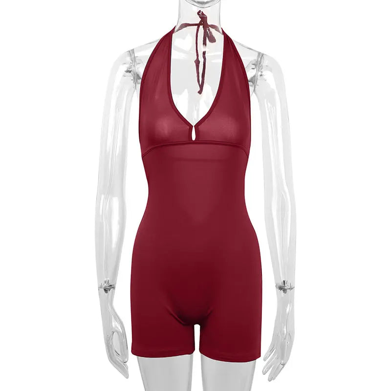 Red swimsuit on a transparent mannequin against a white background