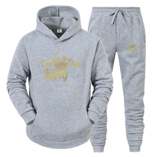 Gray hoodie and jogger set with 'I'm her king' text on a white background