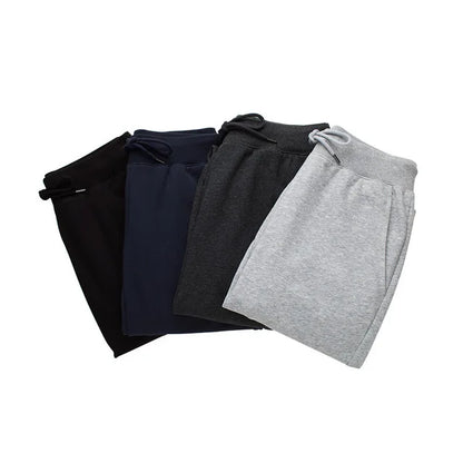 Unisex printed jogging trousers casual sweatpants in black with elastic waist and side pockets