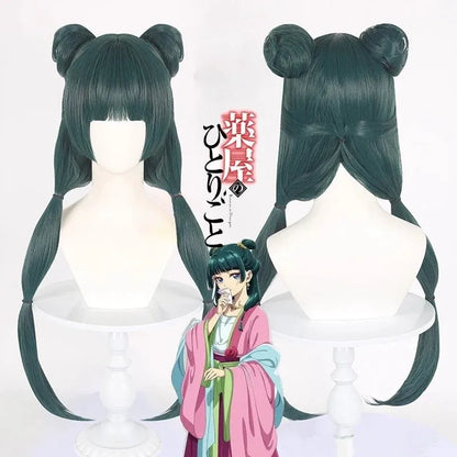 Green twin braid wig on a mannequin head with an anime character illustration.
