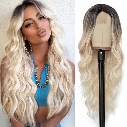 Woman with long blonde hair next to a wig on a mannequin head.