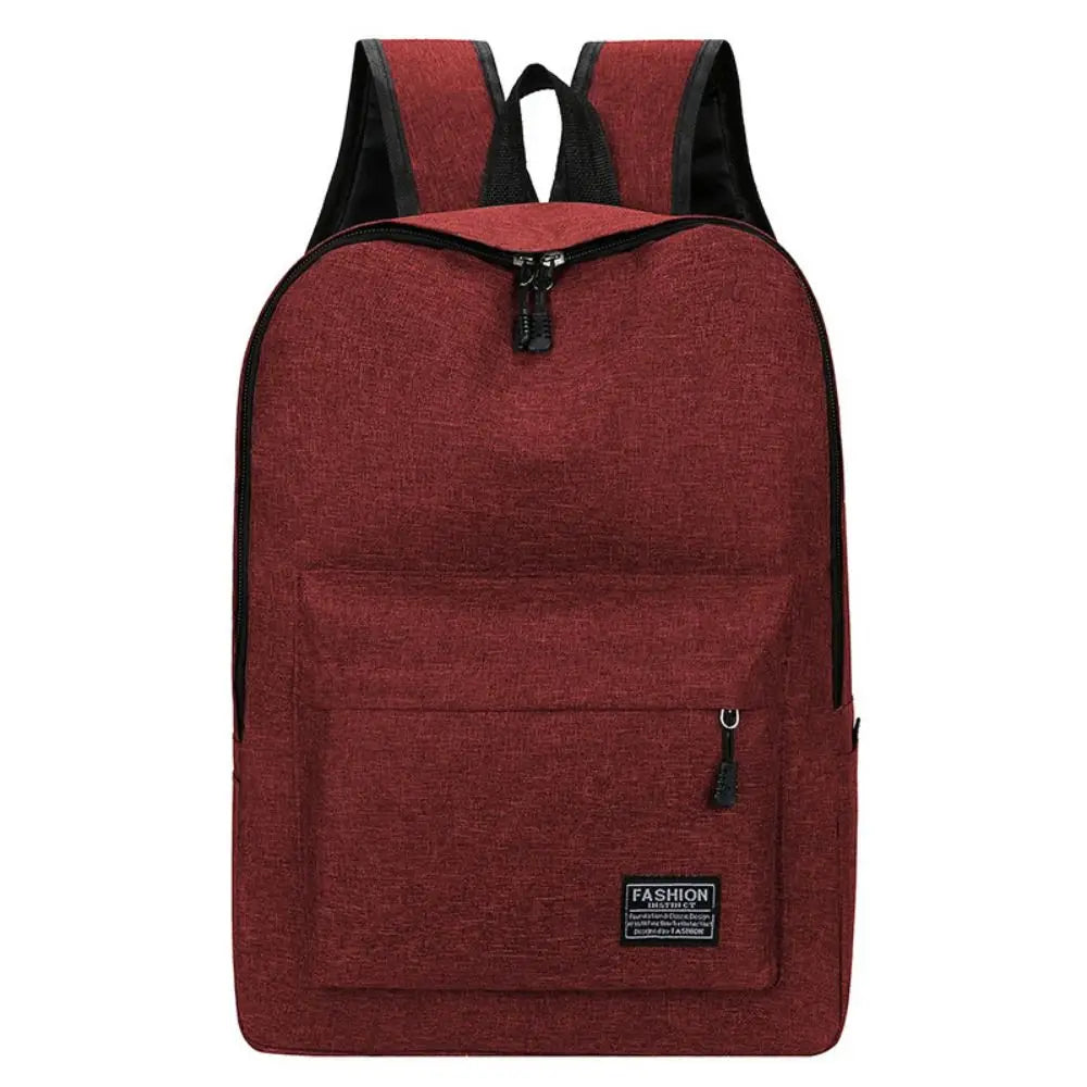 Red backpack with black accents on a white background
