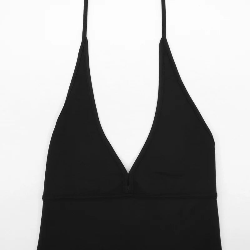 Black spaghetti strap top on a white background